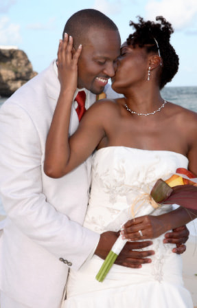 couple kissing on beach