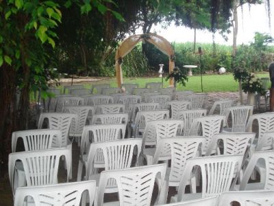 tropical garden ceremony chairs