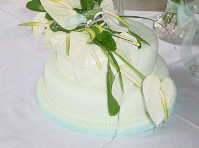 wedding cake tier with anthuriums