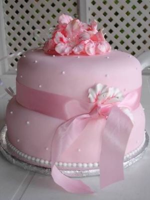 wedding cake tiered cake pink fondant and hibiscus flowers