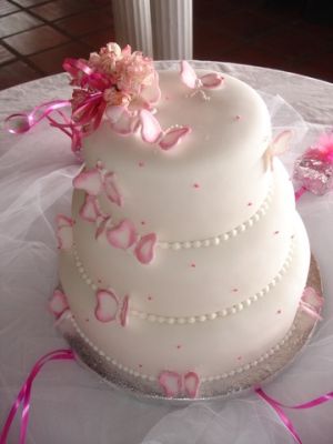 wedding cake 3 tiered cake with pink butterflies
