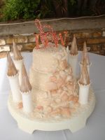 wedding cake castle cake with seashells